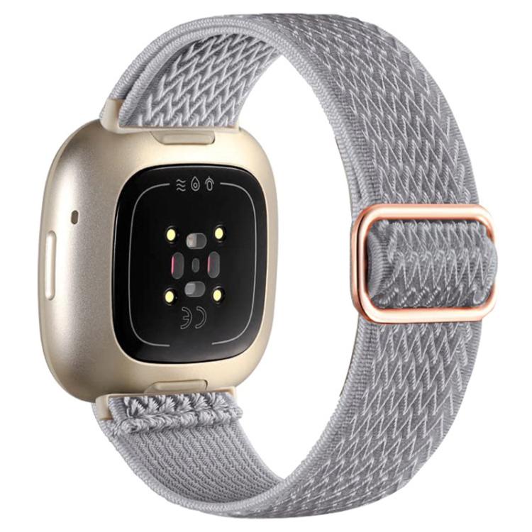 xDfind Wavy Nylon Braided Stretch Watch Band with Adjustment Buckle, For Fitbit Versa 4 / 3 / Sense2 / 1